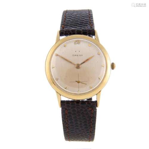 OMEGA - a gentleman's wrist watch. Yellow metal case