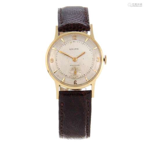 GRUEN - a mid-size wrist watch. Yellow metal case,