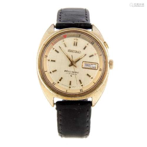 SEIKO - a gentleman's Bell-Matic wrist watch. Gold