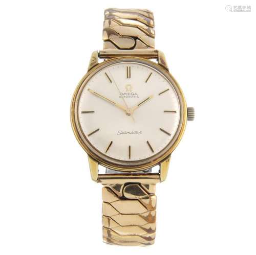 OMEGA - a gentleman's Seamaster bracelet watch. Gold