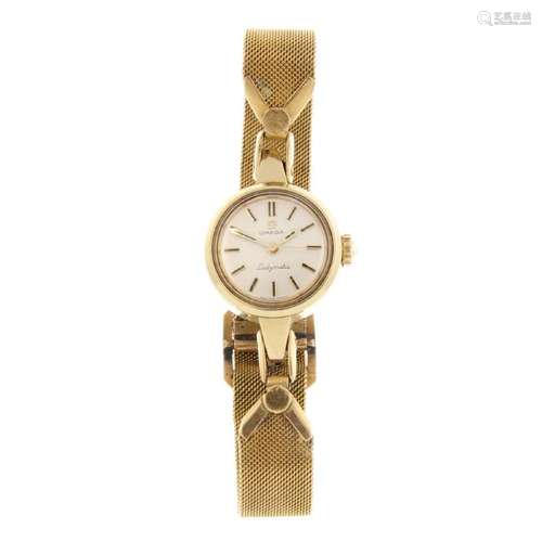 OMEGA - a lady's Ladymatic bracelet watch. Gold plated