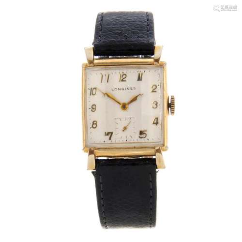 LONGINES - a wrist watch. Gold filled case. Numbered