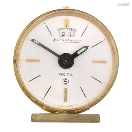 An alarm clock by Jaeger-LeCoultre. Gold plated case.