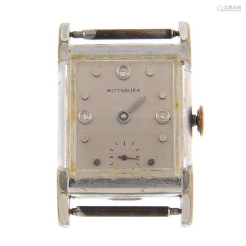 WITTNAUER - a mid-size watch head. White gold filled