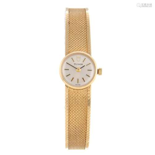 TUDOR - a lady's bracelet watch. 9ct yellow gold case,