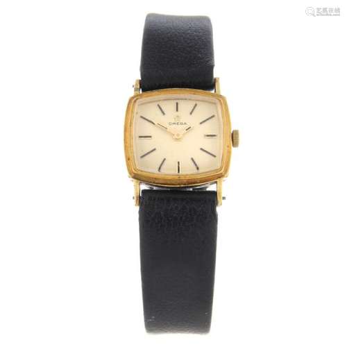 OMEGA - a lady's wrist watch. Gold plated case with