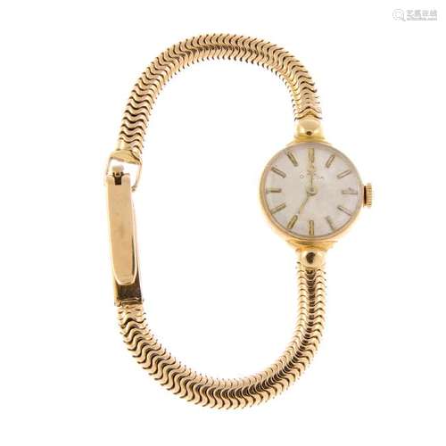 OMEGA - a lady's bracelet watch. 18ct yellow gold case