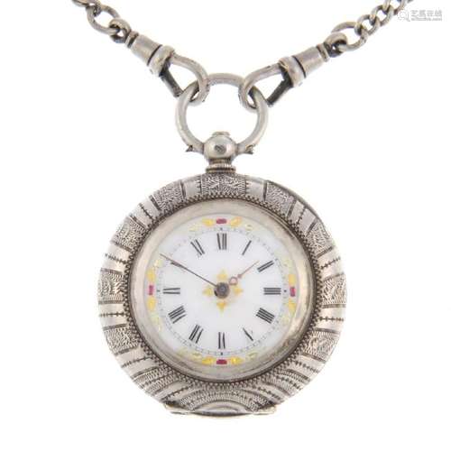 An open face pocket watch. White metal case, stamped