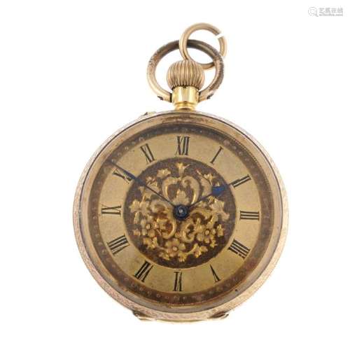 An open face pocket watch. Yellow metal case, stamped