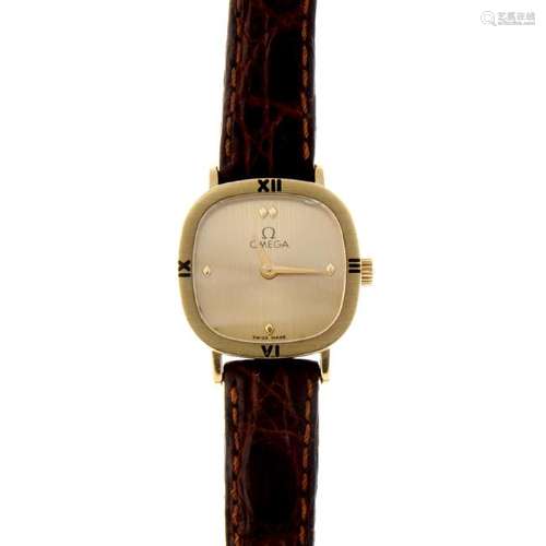 OMEGA - a lady's wrist watch. 9ct yellow gold case.