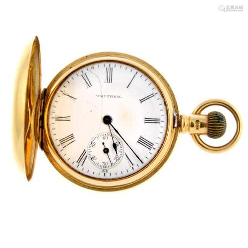 A full hunter pocket watch by Waltham. 18ct yellow gold