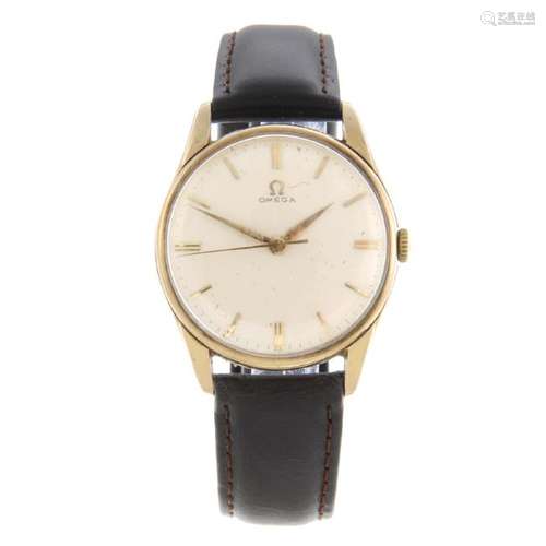 OMEGA - a gentleman's wrist watch. 9ct yellow gold