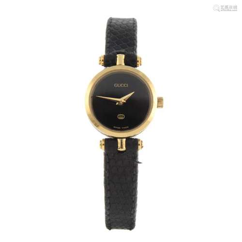 GUCCI - a lady's wrist watch. Gold plated case. Signed