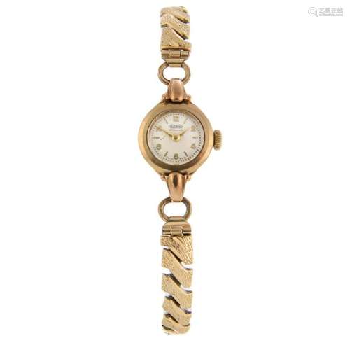 ROTARY - a lady's bracelet watch. 9ct yellow gold case,