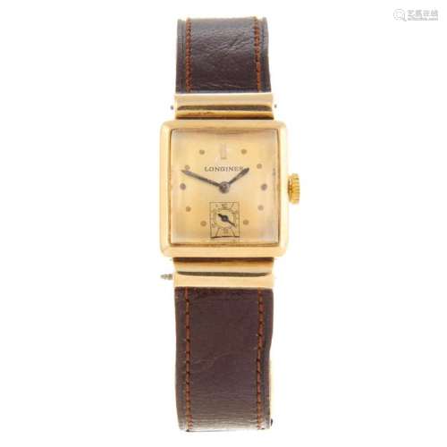 LONGINES - a lady's wrist watch. Yellow metal case,