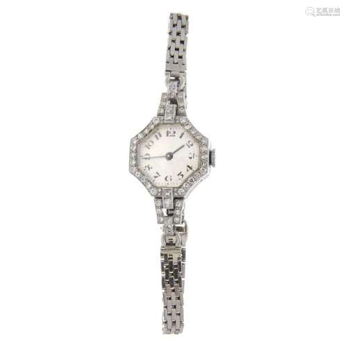 A lady's cocktail watch by Vertex. White metal case