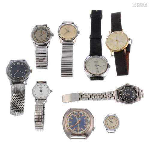 A group of nine assorted mechanical watches. All