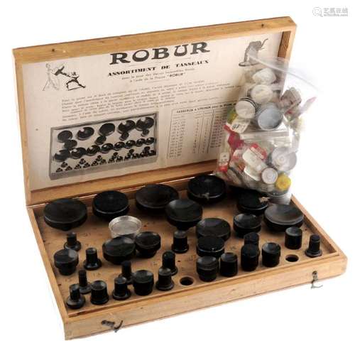 A watch press die set by Robur in a wooden case with