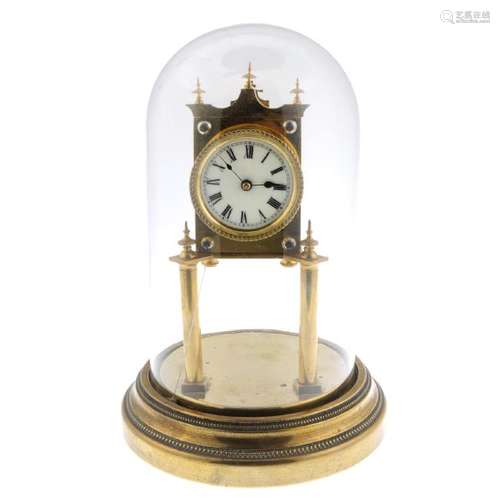 A bell jar table clock. Manual wind movement. White