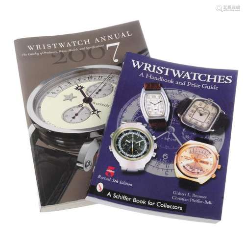 A group of watch price reference books and watch