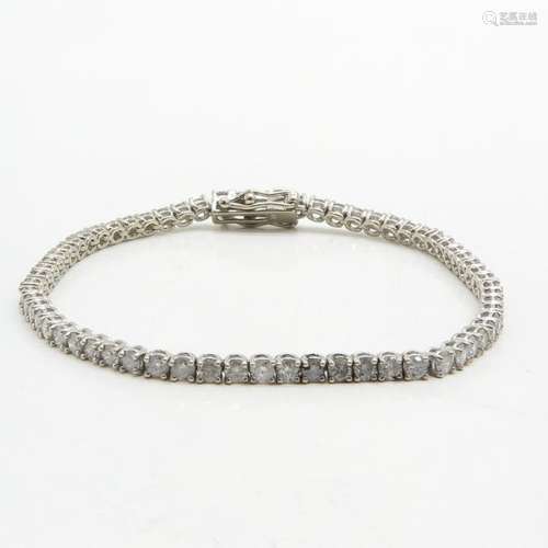 A 14KWG Ladies Diamond Tennis Bracelet