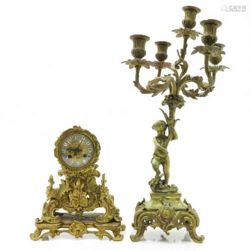 A Bronze Pendule and Candlestick