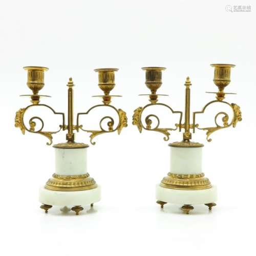 A Pair of Gilt Bronze and White Marble Candlesticks