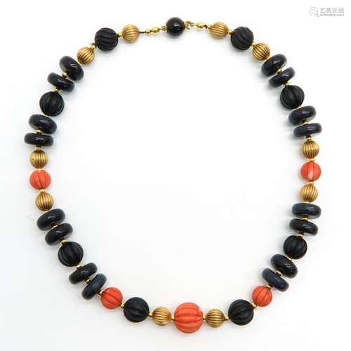 A Carved Red Coral Necklace