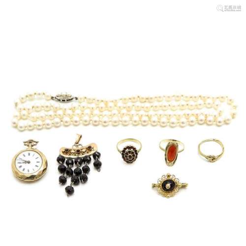 A Diverse Lot of Jewelry Including 14KG Ladies Watch