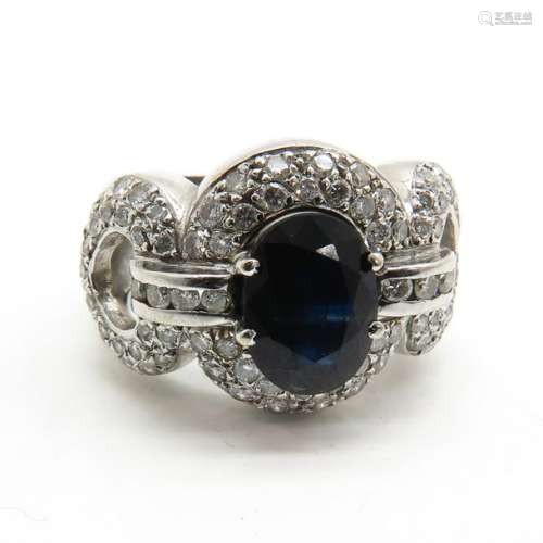 A Ladies 14KWG Diamond and Sapphire Ring