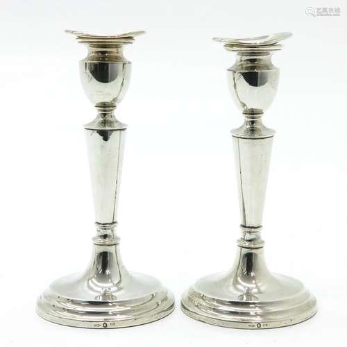 A Pair of Silver Candlesticks