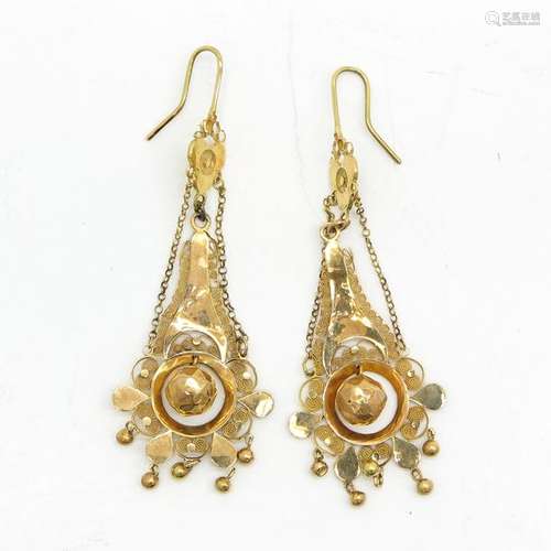 A Pair of Gold Earrings