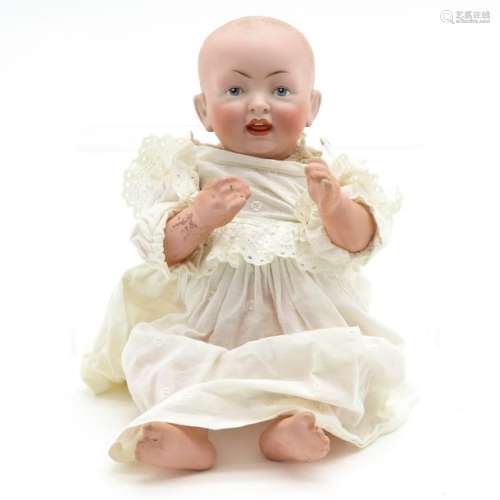 An Antique Character Baby Doll