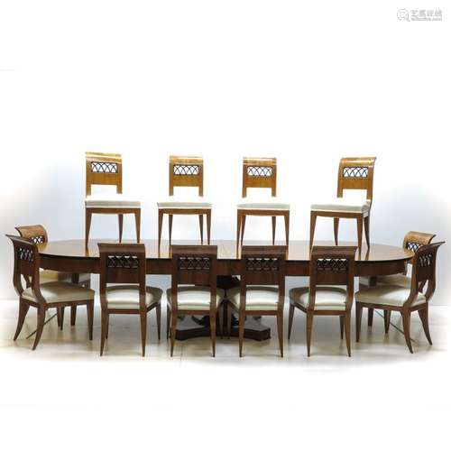 A Dining Table with 4 Leaves and 12 Chairs