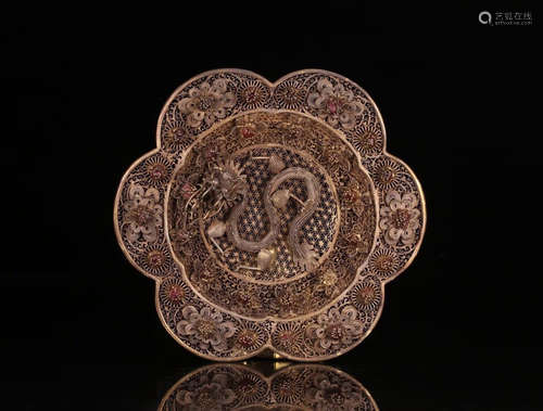 A GILT SILVER FILIGREE FLORAL SHAPED PLATE