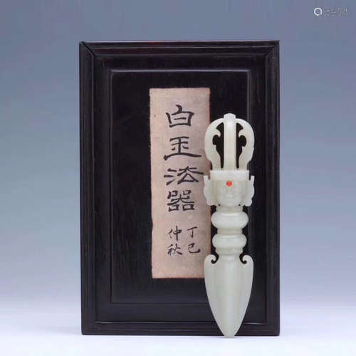 A HETIAN WHITE JADE BUDDHIST INSTRUMENT