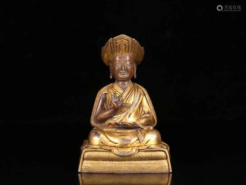 A TIBETAN GILT BRONZE BUDDHA