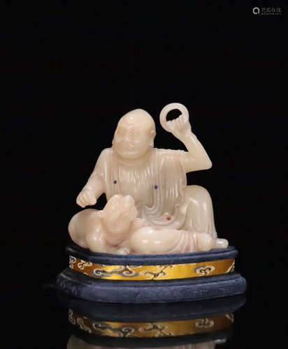 A FURONG SOAPSTONE LUOHAN FIGURE