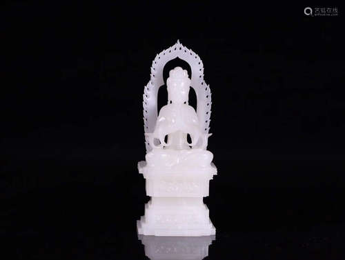 A HETIAN JADE SITTING GUANYIN FIGURE