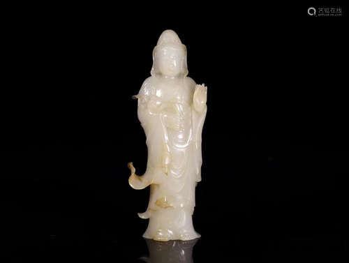 A HETIAN JADE CARVED STANDING GUANYIN FIGURE