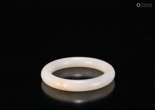 A HETIAN JADE CARVED BANGLE