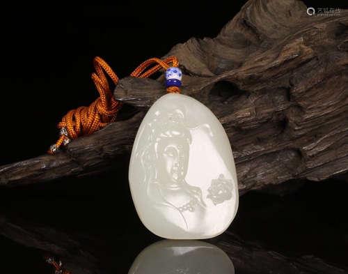 A HETIAN JADE CARVED GUANYIN DESIGN PENDANT