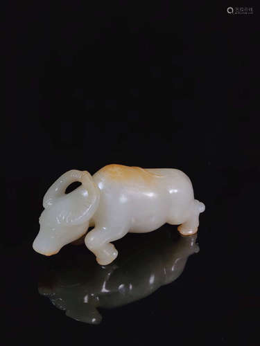 A HETIAN JADE COW SHAPED PENDANT