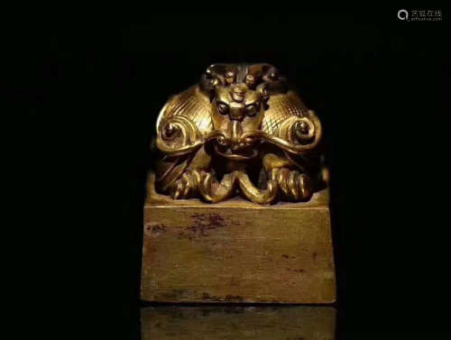 A GILT COPPER BEAST SHAPED SQUARE SEAL