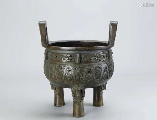 A BEAST PATTERN TRIPOD COPPER CENSER