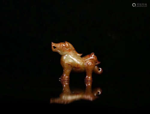 A GAOGU JADE BEAST SHAPED PENDANT