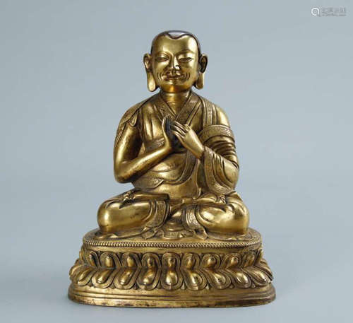 A GILT BRONZE SHANGSHI BUDDHA STATUE