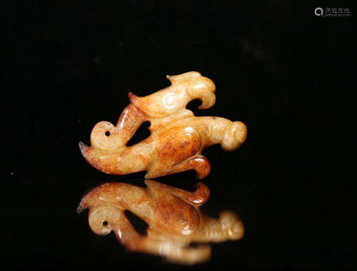 A GAOGU JADE BEAST SHAPED PENDANT