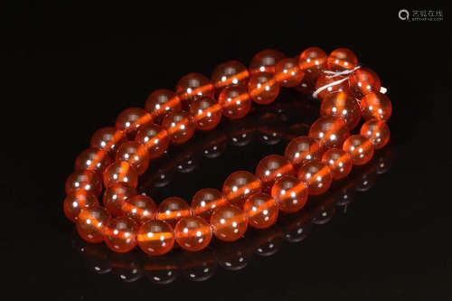 A HUPO AMBER BEADS STRING NECKLACE