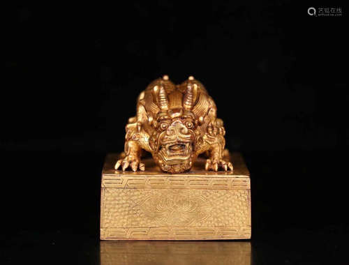 A COPPER GILT TIBETAN DRAGON SHAPED SEAL